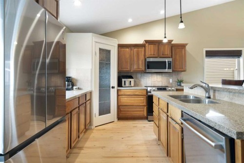 57 Thornfield Close Se, Airdrie, AB - Indoor Photo Showing Kitchen With Double Sink