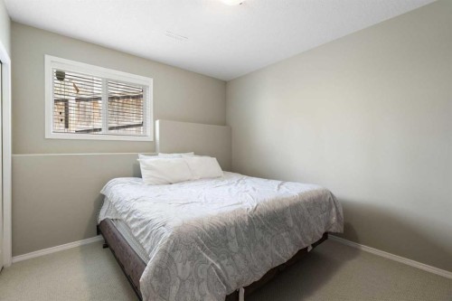 57 Thornfield Close Se, Airdrie, AB - Indoor Photo Showing Bedroom