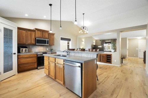 57 Thornfield Close Se, Airdrie, AB - Indoor Photo Showing Kitchen With Double Sink