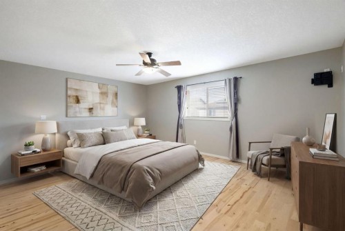 57 Thornfield Close Se, Airdrie, AB - Indoor Photo Showing Bedroom