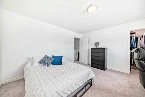 54 Panatella Park Nw, Calgary, AB - Indoor Photo Showing Bedroom