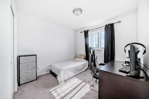 54 Panatella Park Nw, Calgary, AB - Indoor Photo Showing Bedroom