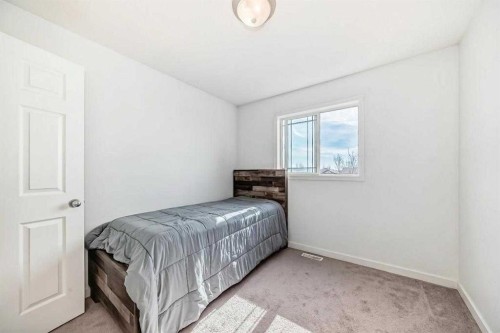 54 Panatella Park Nw, Calgary, AB - Indoor Photo Showing Bedroom