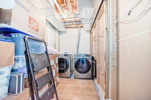 54 Panatella Park Nw, Calgary, AB - Indoor Photo Showing Laundry Room