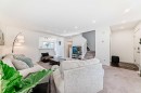 54 Panatella Park Nw, Calgary, AB  - Indoor Photo Showing Living Room 