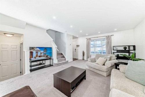 54 Panatella Park Nw, Calgary, AB - Indoor Photo Showing Living Room