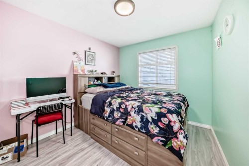 44 Canoe Square Sw, Airdrie, AB - Indoor Photo Showing Bedroom