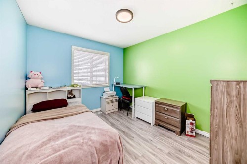 44 Canoe Square Sw, Airdrie, AB - Indoor Photo Showing Bedroom