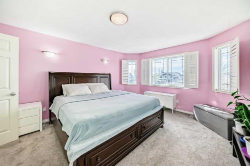 44 Canoe Square Sw, Airdrie, AB - Indoor Photo Showing Bedroom