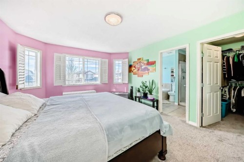 44 Canoe Square Sw, Airdrie, AB - Indoor Photo Showing Bedroom