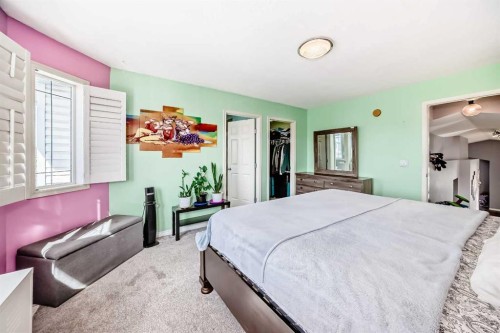 44 Canoe Square Sw, Airdrie, AB - Indoor Photo Showing Bedroom