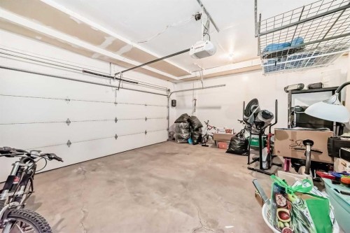 44 Canoe Square Sw, Airdrie, AB - Indoor Photo Showing Garage