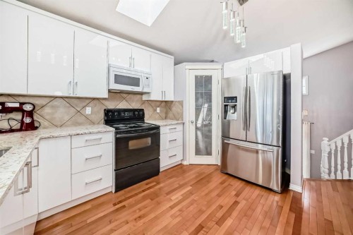 44 Canoe Square Sw, Airdrie, AB - Indoor Photo Showing Kitchen