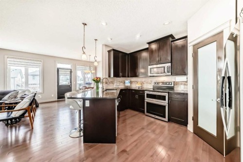 70 Sage Berry Way Nw, Calgary, AB - Indoor Photo Showing Kitchen With Stainless Steel Kitchen With Upgraded Kitchen