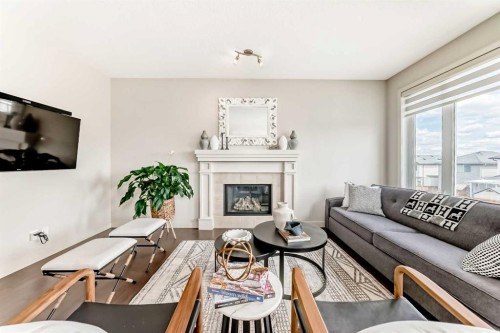 70 Sage Berry Way Nw, Calgary, AB - Indoor Photo Showing Living Room With Fireplace