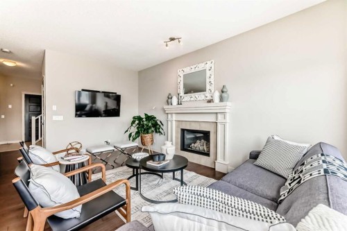 70 Sage Berry Way Nw, Calgary, AB - Indoor Photo Showing Living Room With Fireplace