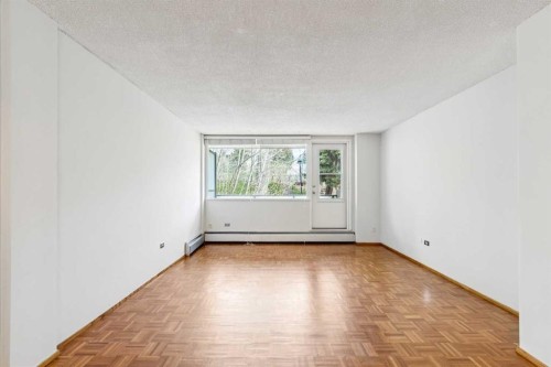 357-1620 8 Avenue Nw, Calgary, AB - Indoor Photo Showing Other Room