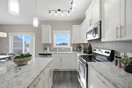 556 Redstone View Ne, Calgary, AB - Indoor Photo Showing Kitchen With Upgraded Kitchen