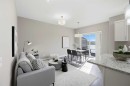 556 Redstone View Ne, Calgary, AB  - Indoor Photo Showing Living Room 