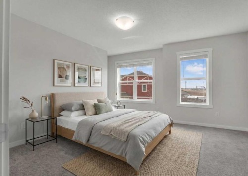 616 Cranford Mews Se, Calgary, AB - Indoor Photo Showing Bedroom