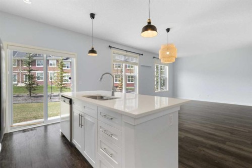 1908-881 Sage Valley Boulevard Nw, Calgary, AB - Indoor Photo Showing Kitchen With Double Sink