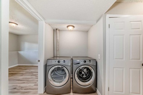 F-903 44 Street Se, Calgary, AB - Indoor Photo Showing Laundry Room
