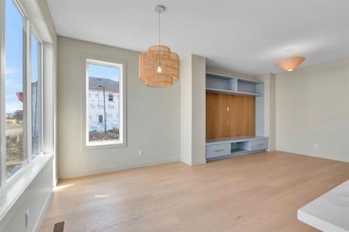 96 Fireside Common, Cochrane, AB - Indoor Photo Showing Other Room