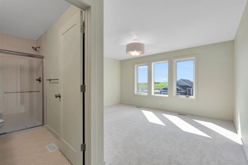 96 Fireside Common, Cochrane, AB - Indoor Photo Showing Other Room