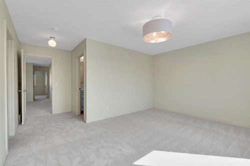 96 Fireside Common, Cochrane, AB - Indoor Photo Showing Other Room