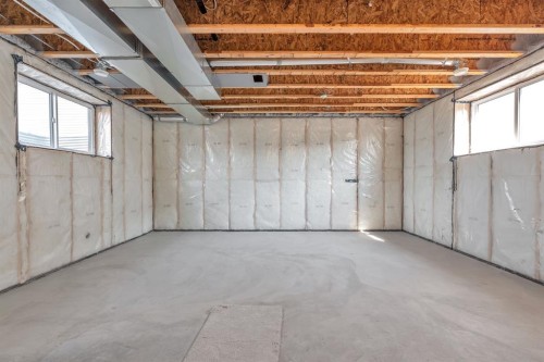 96 Fireside Common, Cochrane, AB - Indoor Photo Showing Basement