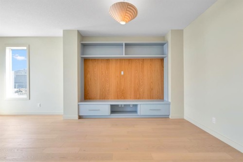 96 Fireside Common, Cochrane, AB - Indoor Photo Showing Other Room