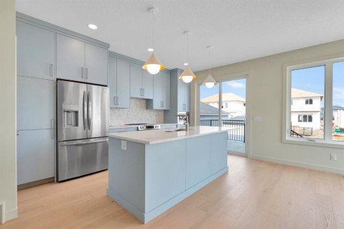 96 Fireside Common, Cochrane, AB - Indoor Photo Showing Kitchen With Stainless Steel Kitchen With Upgraded Kitchen
