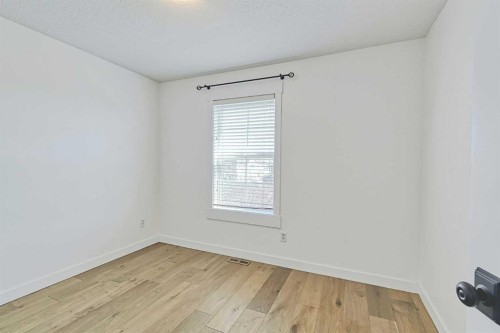 179 Rainbow Falls Drive, Chestermere, AB - Indoor Photo Showing Other Room