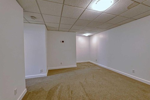 179 Rainbow Falls Drive, Chestermere, AB - Indoor Photo Showing Other Room