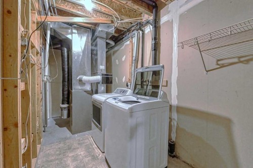 179 Rainbow Falls Drive, Chestermere, AB - Indoor Photo Showing Laundry Room