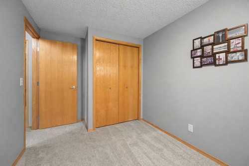 7 Straddock Crescent Sw, Calgary, AB - Indoor Photo Showing Other Room