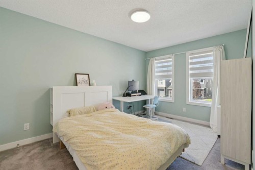 52 Mahogany Way Se, Calgary, AB - Indoor Photo Showing Bedroom