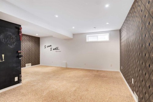81 Inglewood Point Se, Calgary, AB - Indoor Photo Showing Basement