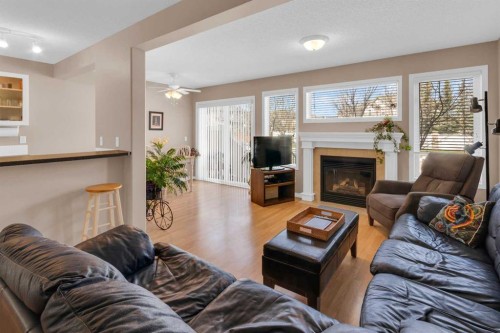 27 Royal Birch Mount Nw, Calgary, AB - Indoor Photo Showing Living Room With Fireplace