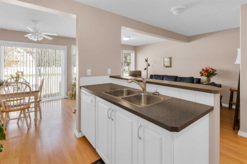 27 Royal Birch Mount Nw, Calgary, AB - Indoor Photo Showing Kitchen With Double Sink