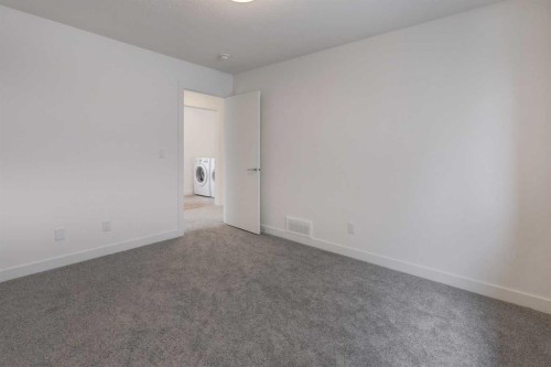 1333 South Point Parade Sw, Airdrie, AB - Indoor Photo Showing Other Room