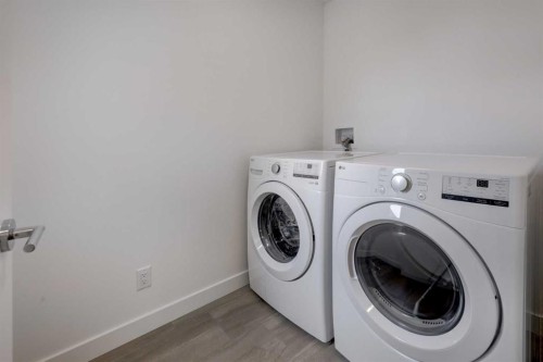 1333 South Point Parade Sw, Airdrie, AB - Indoor Photo Showing Laundry Room