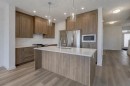 1333 South Point Parade Sw, Airdrie, AB  - Indoor Photo Showing Kitchen With Double Sink With Upgraded Kitchen 