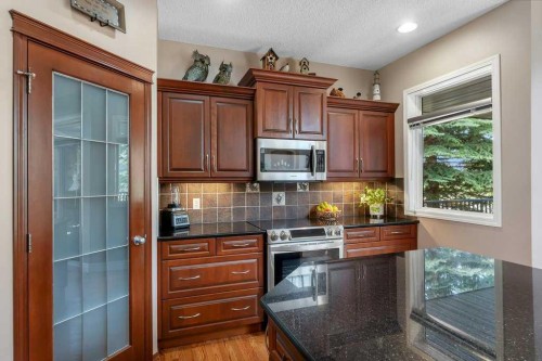 101 Valley Creek Place Nw, Calgary, AB - Indoor Photo Showing Kitchen