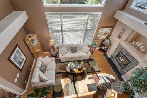 101 Valley Creek Place Nw, Calgary, AB - Indoor Photo Showing Other Room With Fireplace