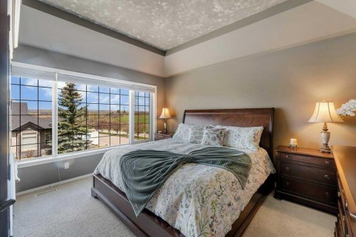 101 Valley Creek Place Nw, Calgary, AB - Indoor Photo Showing Bedroom
