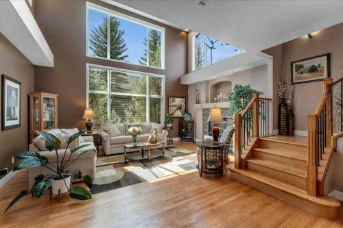 101 Valley Creek Place Nw, Calgary, AB - Indoor Photo Showing Other Room With Fireplace