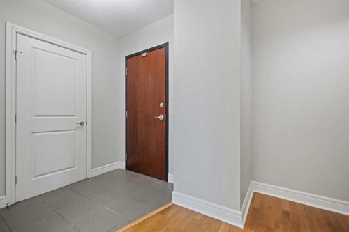 1607-910 5 Avenue Sw, Calgary, AB - Indoor Photo Showing Other Room