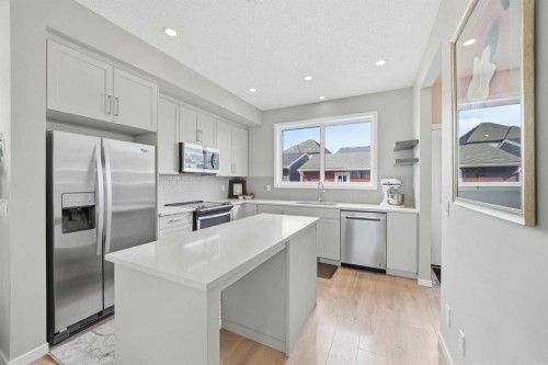 8112 Masters Boulevard Se, Calgary, AB - Indoor Photo Showing Kitchen With Upgraded Kitchen