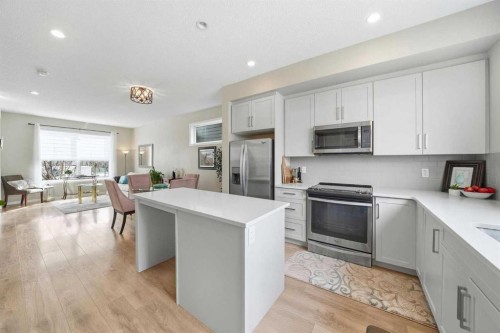 8112 Masters Boulevard Se, Calgary, AB - Indoor Photo Showing Kitchen With Upgraded Kitchen